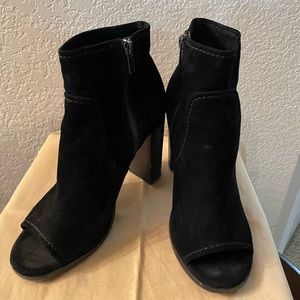 Black open toe boots.